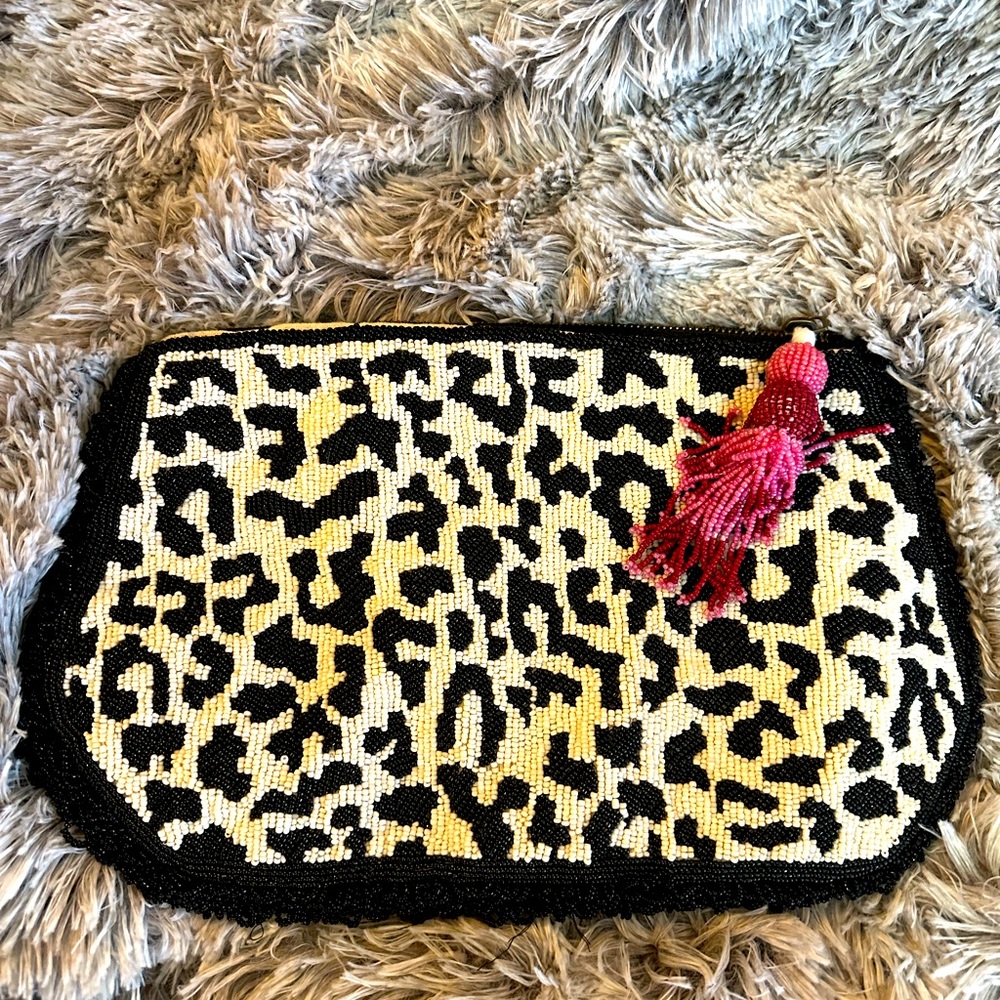 Amazing beaded clutch by Anthropologie.